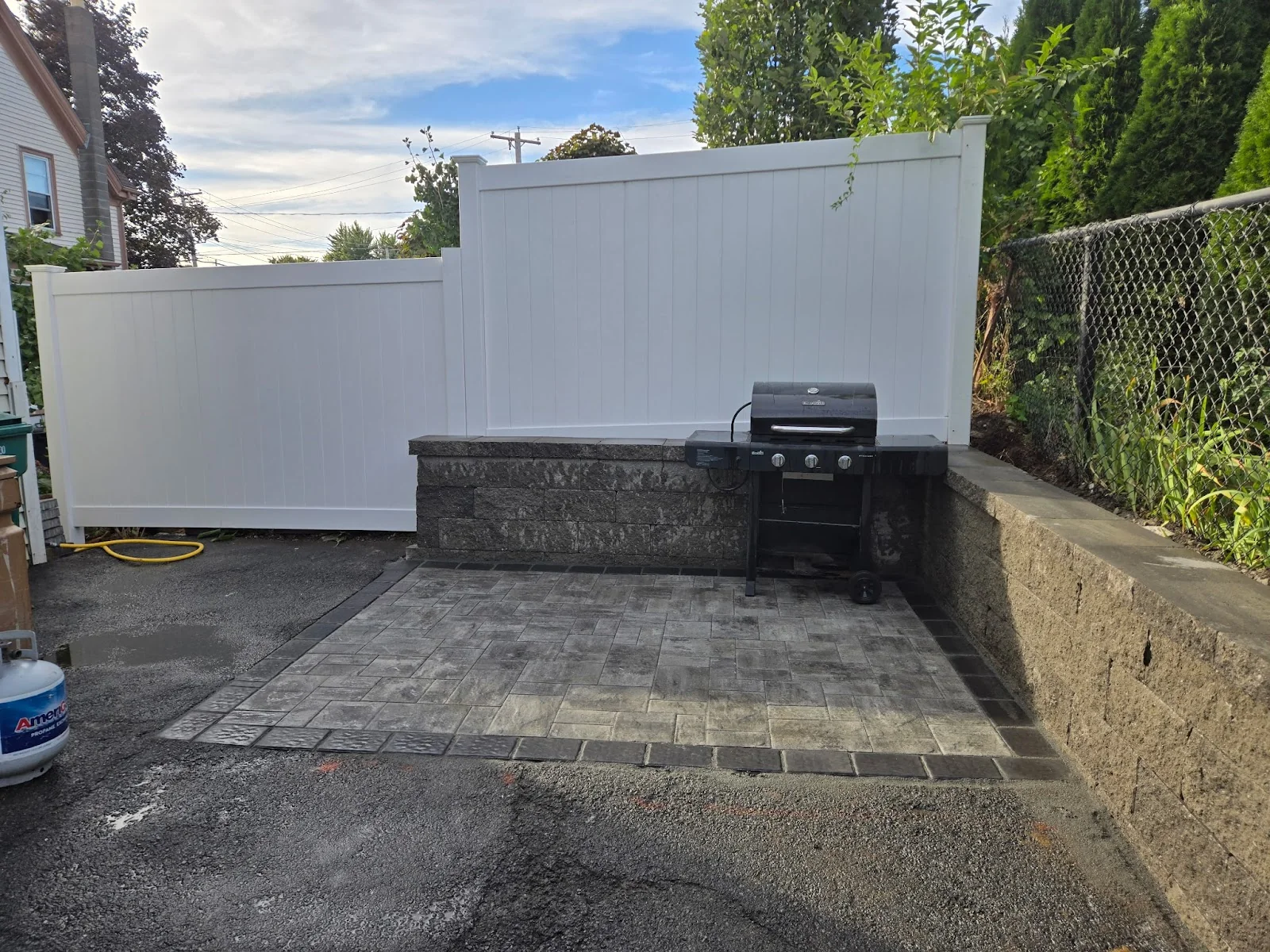 Completed paver patio and outdoor grill area by W and G